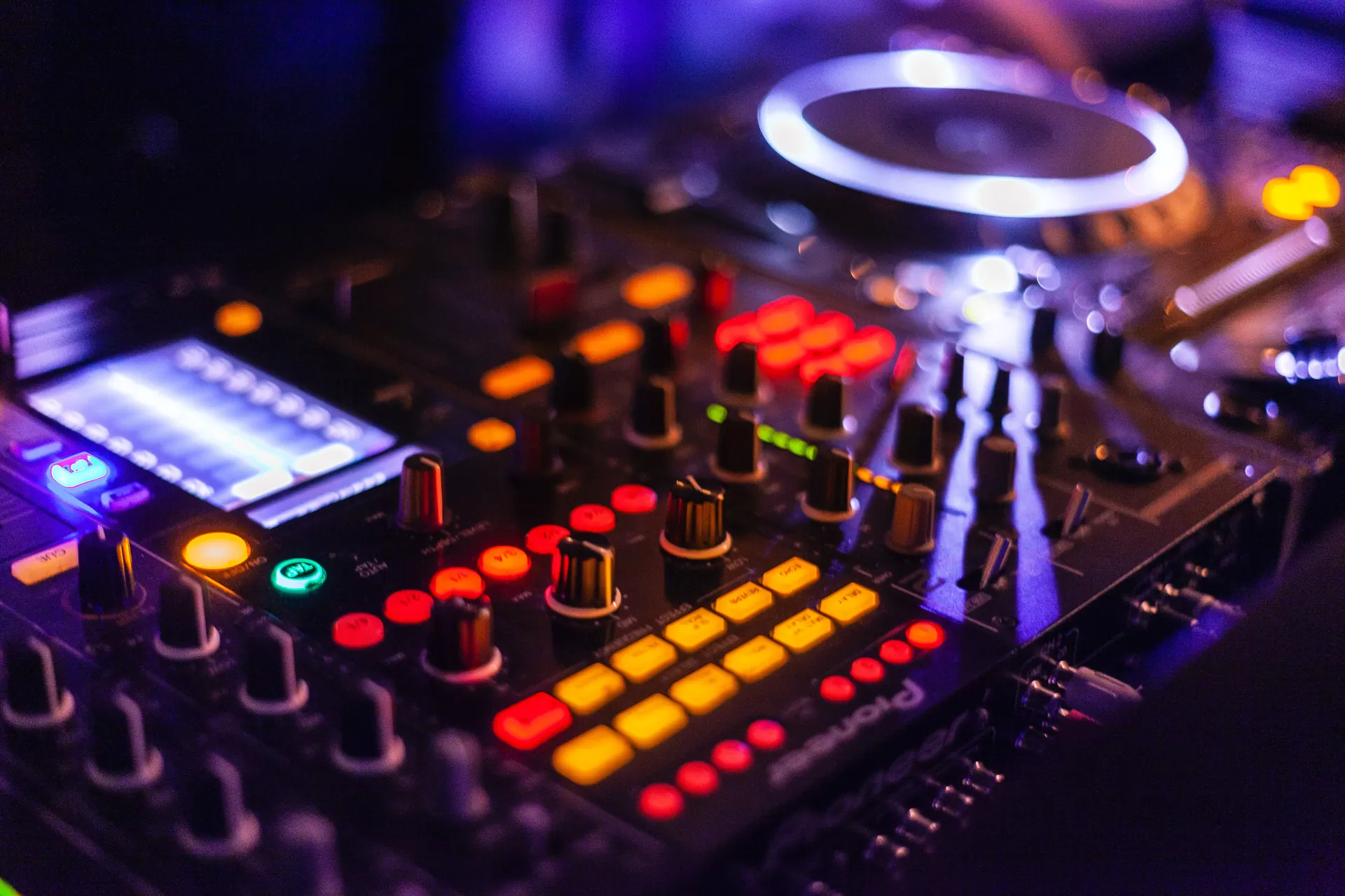 Close-up of a Pioneer DJ controller lit up during an event