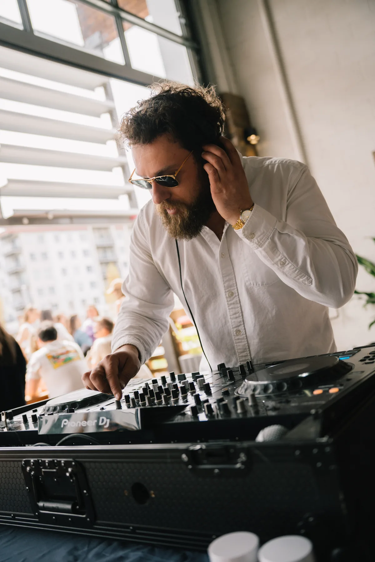 Kris Falco DJing a daytime event at Rustic Reel in Kelowna